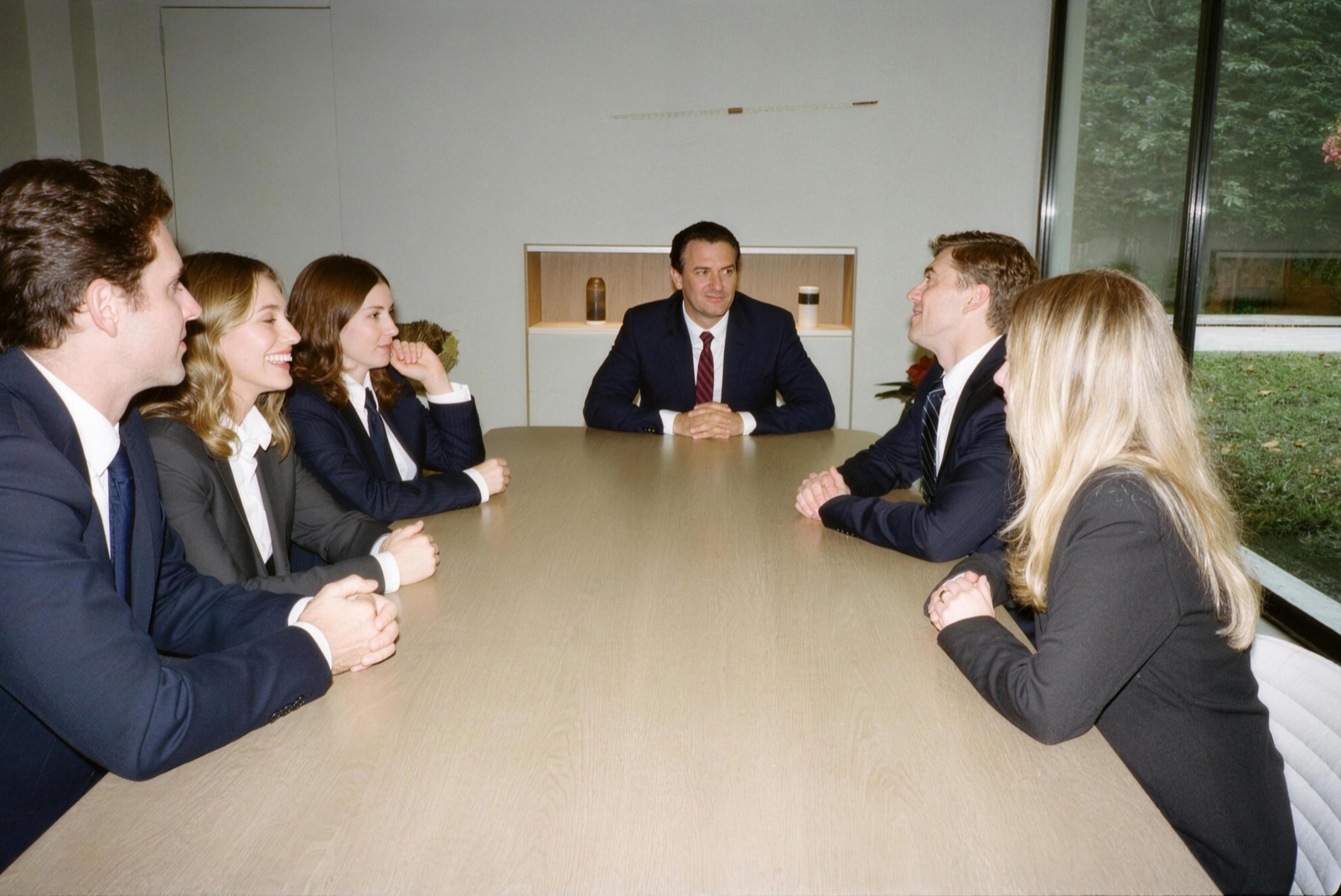 The CBS team around the boardroom table