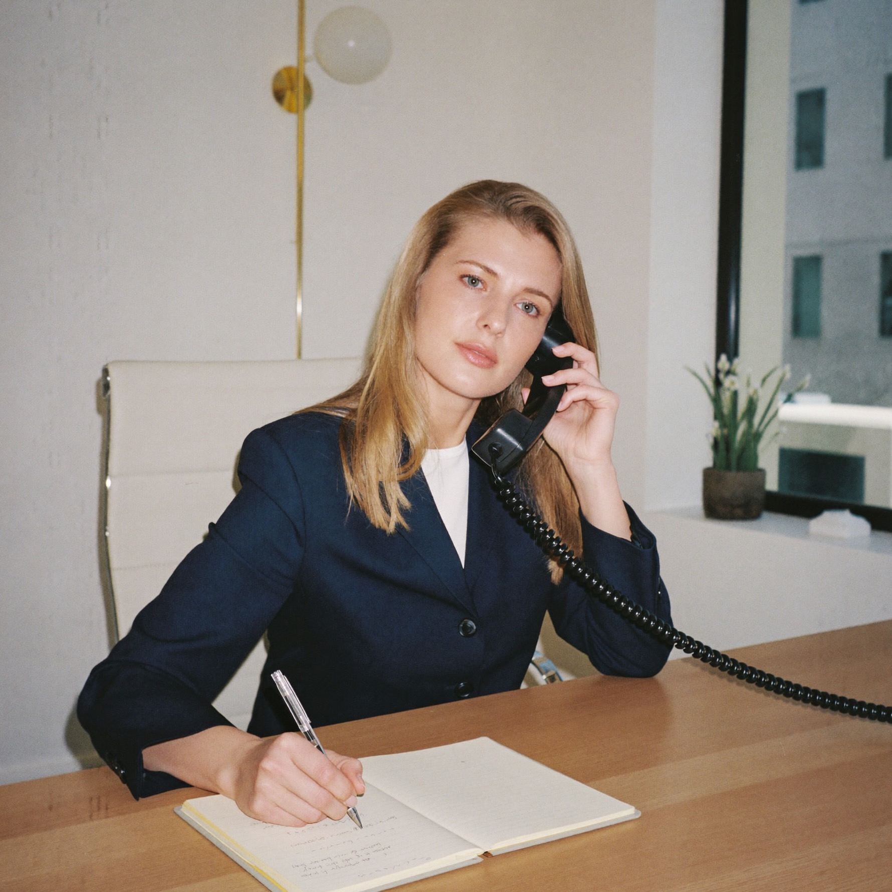 A revenue cycle specialist on a call with a payer